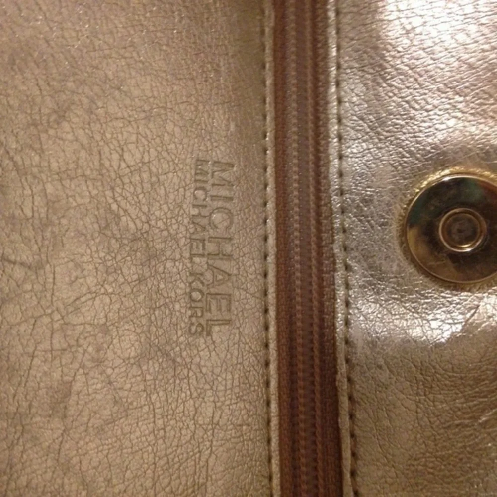 Michael Kors gold metallic leather bag